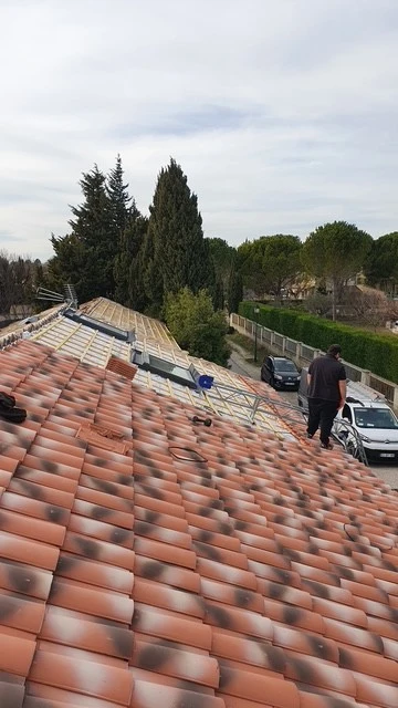 Pose de tuiles mécaniques